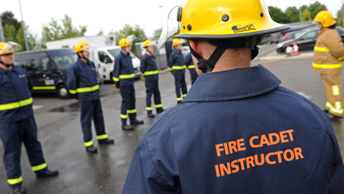 A Fire Cadet Instructor leading parade.