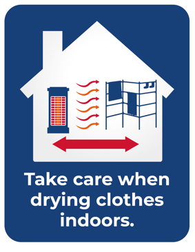 Graphic showing clothes being dried inside with a heater. Text reads: Take care when drying clothes indoors.